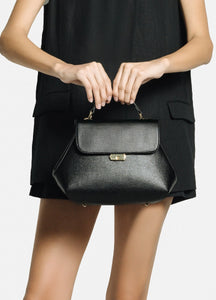 Bolso de mano hecho en piel 