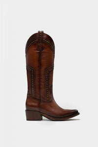 botas de piel hechas en fashion week